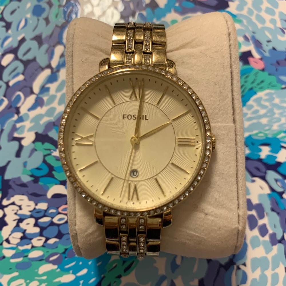 Gold fossil watch